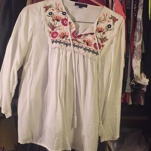 Cream with embroidered design